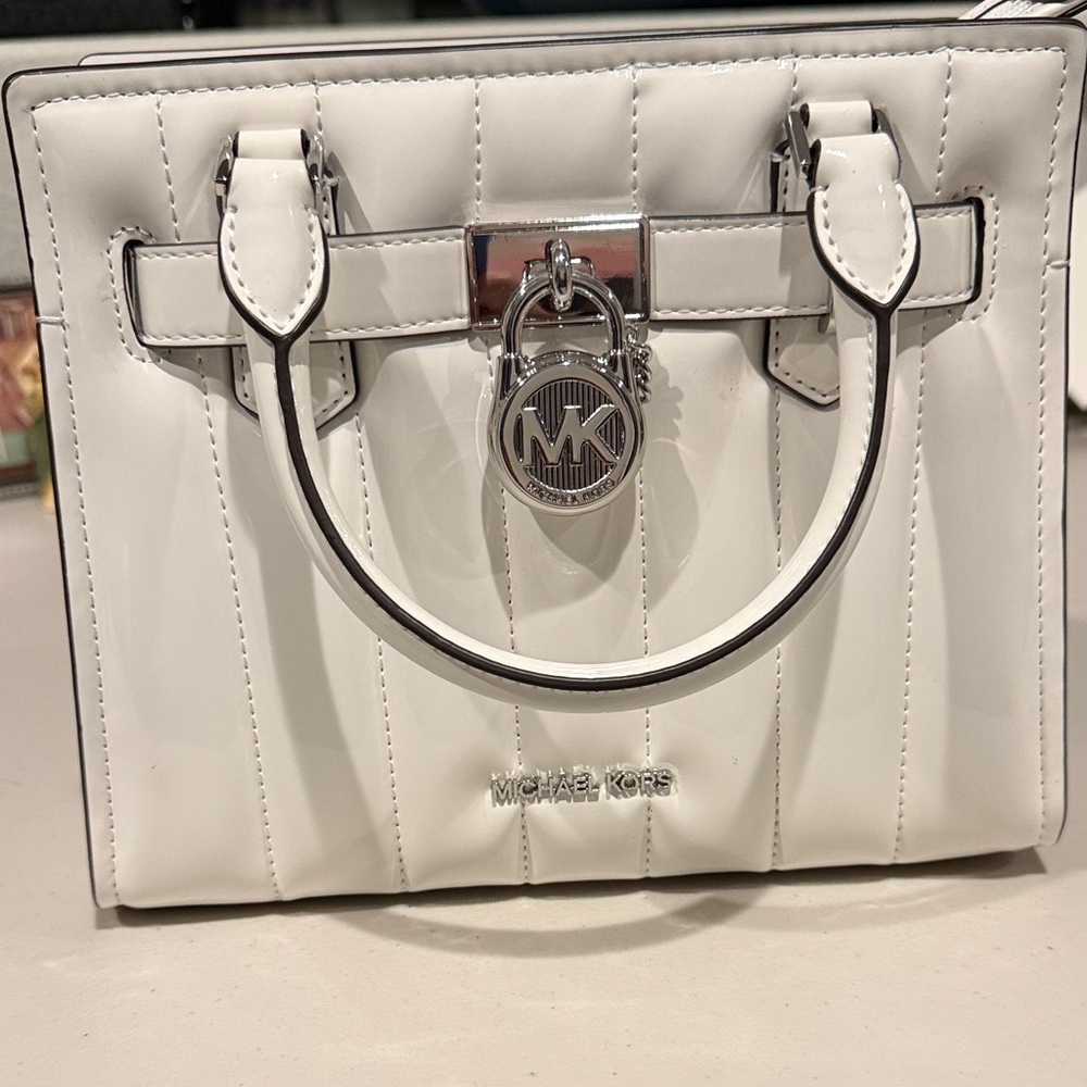 Michael Kors White Satchel with Silver Accents a few callouts on the bottom
